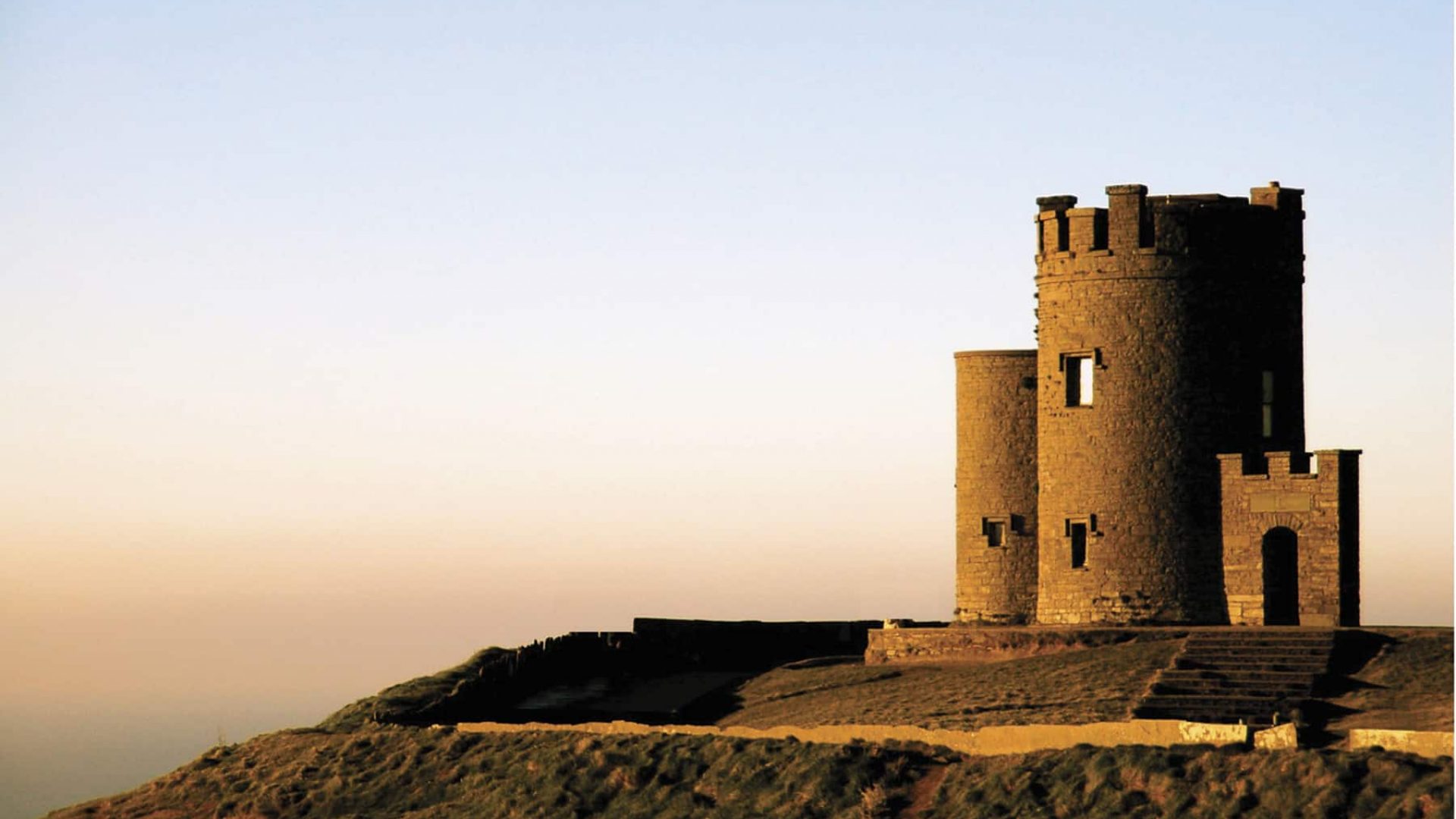 O’Brien’s Tower on the Cliffs of Moher, Co. Clare, at sunset O'Brien's Tower on the Cliffs of Moher, Co. Clare, at sunset